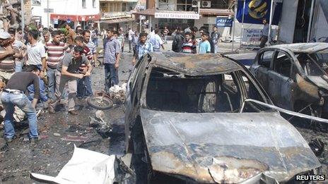 Mangled cars at a bomb scene in Reyhanli, Turkey, 11 May