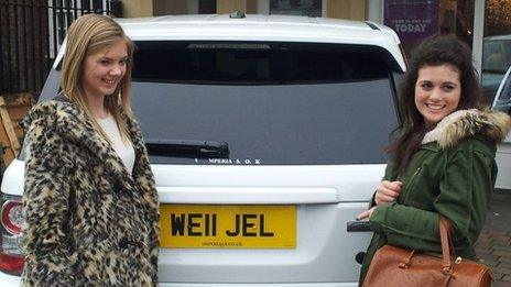 People posing with Range Rover