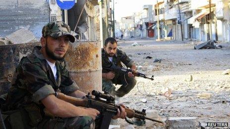 Syrian rebel fighters in the town of Qusair (5 May 2012)