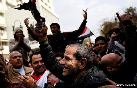 Anti-government protesters demonstrate near the Egyptian Parliament building on 9 February, 2011, in Cairo, Egypt