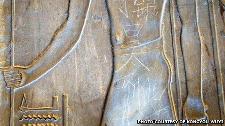 This photo taken at the Luxor Temple in Egypt on 6 May 2013 shows graffiti reportedly from a Chinese tourist