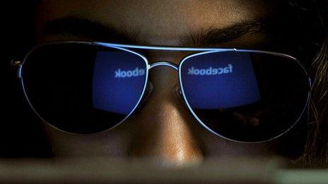 Facebook logo reflected in sunglasses