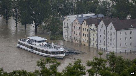 A boat waits in front of the flooded old centre of Passau