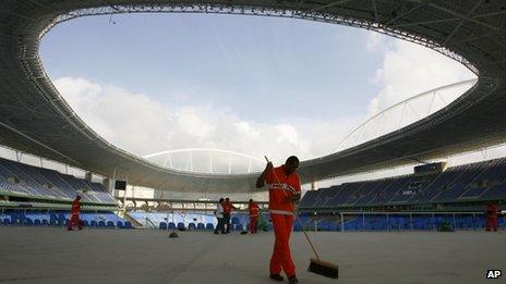 In this 2007 file photo, workers clean the Joao Havelange stadium