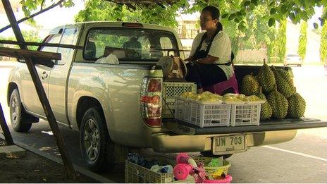 Manee Thongchum selling fruit at the petrol station where Jiji disappeared