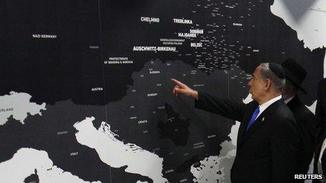 Israeli Prime Minister Benjamin Netanyahu points at a map showing where Jews were killed during the Holocaust at the opening of the Permanent Exhibition SHOAH at the former Nazi death camp Auschwitz-Birkenau State Museum, Block 27,