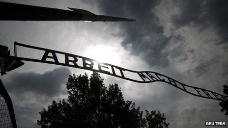 The sign "Arbeit macht frei" at the main gate to the Auschwitz concentration camp is seen on June 11, 2013.