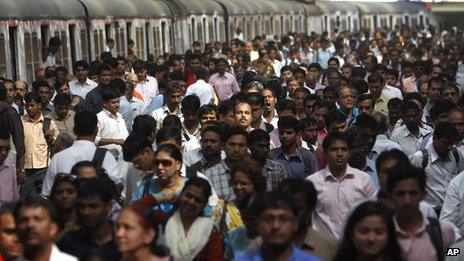 Commuters disembark from trains in Mumbai (file photo)
