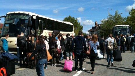 Rail passengers boarding buses at Norwich