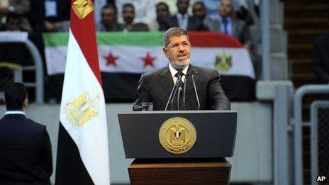 Egyptian President Mohammed Morsi addresses a rally to show solidarity with the people of Syria, 16 June 2013