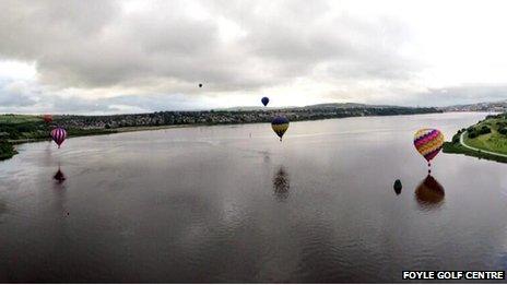 At one point, the balloons skimmed low over the River Foyle