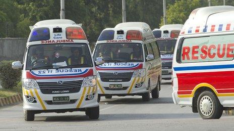 Ambulances carry the bodies of the foreign tourists (23 June 2013)
