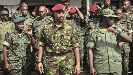 Brigadier Muhoozi Kainerugaba (C) with other officers on 16 August 2012