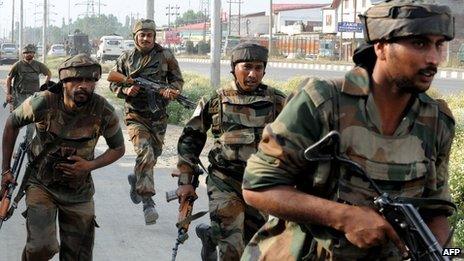Indian soldiers at the scene of the shooting in Srinagar on 24 June 2013