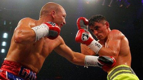 Gavin Rees (left) exchanges blows with Anthony Crolla