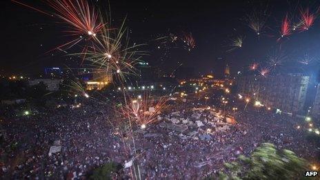 Fireworks over Tahrir Square following the army's announcement on 3 July