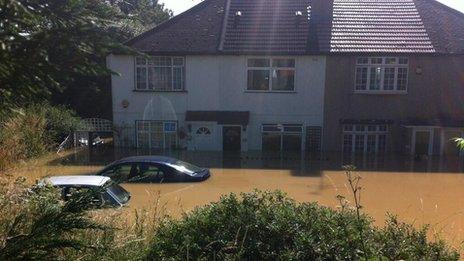 Burst pipe in Greenford sees four rescued - BBC News