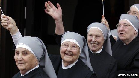 Four Catholic nuns in a row