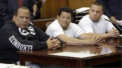 Defendants Anthony Santoro, left, Vito Badano, centre, and Ernest Aiello as their charges are read in New York on 9 July 2013