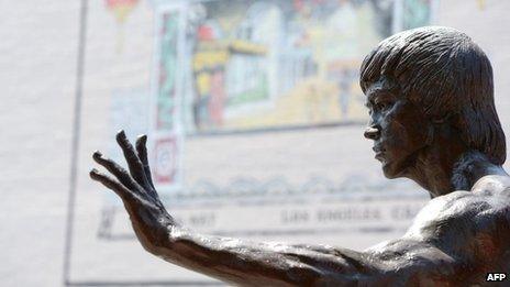 A statute of the late martial arts icon Bruce Lee is seen in Chinatown in downtown Los Angeles, 16 June 2013