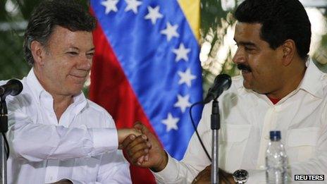 Juan Manuel Santos (left) and Nicolas Maduro (right)