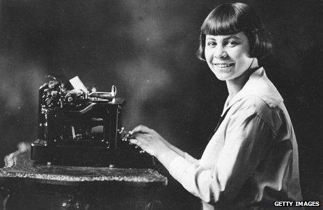 A 16-year-old Birdie Reeve, a champion typist capable of typing more than 200 words a minute, sitting at a typewriter in 1923