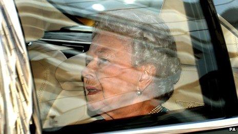 Queen in Bentley car leaving Kensington Palace