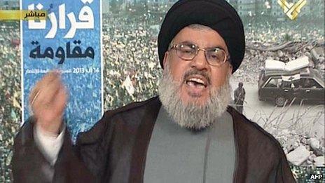An image grab from Hezbollah's al-Manar TV shows Hassan Nasrallah, the head of Lebanon's militant Shiite Muslim movement Hezbollah, giving a televised address from an undisclosed location on 16 August, 2013 in Lebanon.