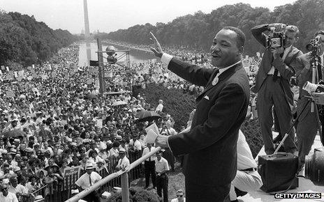 Martin Luther King waves to supporters from the steps of the Lincoln Memorial 28 August, 1963