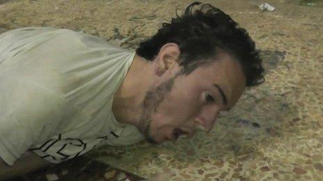 Alleged victim of chemical weapons attack appears to be convulsing on the floor on 21 August 2013