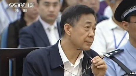 This screen grab taken from CCTV footage released on 26 August 2013 shows ousted Chinese political star Bo Xilai looking on as he stands on trial in the Intermediate People's Court in Jinan, east China's Shandong province