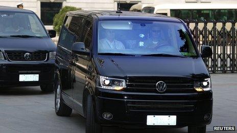 A minivan believed to be carrying disgraced Chinese politician Bo Xilai leaves the Jinan Intermediate People's Court after the end of the fifth day of Bo's trial in Jinan, Shandong province, 26 August 2013