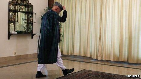 Afghan President Hamid Karzai in Islamabad on 26 August 2013