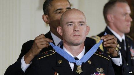 President Barack Obama awards US Army Staff Sgt Ty M Carter the Medal of Honor for conspicuous gallantry 26 August 2013