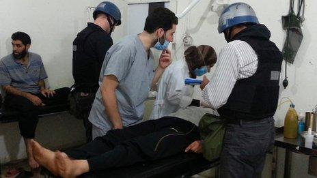 UN chemical weapons experts at a Syrian hospital on 26 August 2013