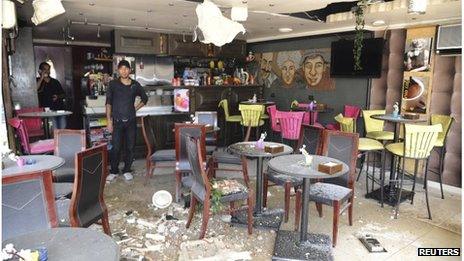 A cafe damaged by a rocket in the al-Maliki district of Damascus, Syria (2 Sept 2013)