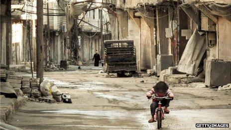 Little girl on bike in Damascus