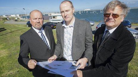 Councillor J Arwel Roberts, Deputy Leader of Isle of Anglesey Council, Matt Osmont, of heritage architects Purcell and Graham Van Weert, whose father, Mathieu, was a Dutch sailor.