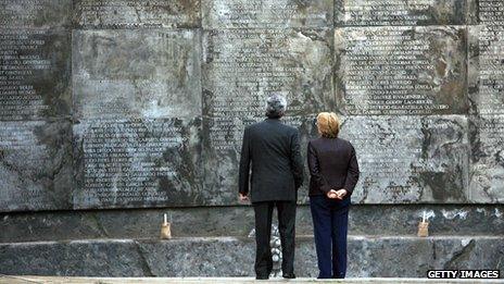 Former Chilean President Michelle Bachelet (right) observes the memorial to the missing at Villa Grimaldi, a torture centre during the military regime in 2006