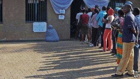 Rwandan voters queue outside at a polling station in the capital Kigali on September 16, 2013