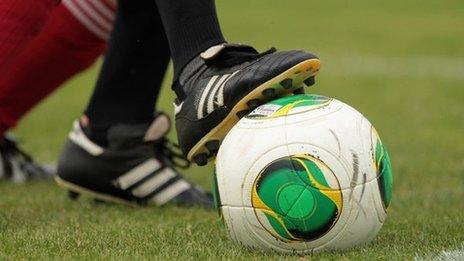 File photo: foot on a football