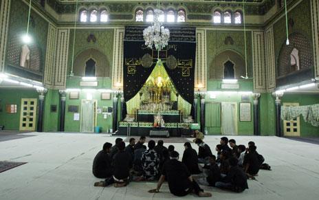 Indian Shiite Muslims take part in religious prayers at 'Ashoorkhana' in the Aza Khana Zehara in Hyderabad, on January 5, 2009. The structure, built by the seventh Nizam Mir Osman Ali Kahan to perpetuate the memory of his mother Amtul Zehra Begum