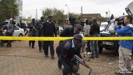 Security officers cross cordon on 23 September 2013