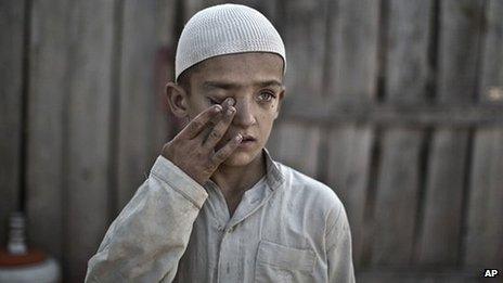 Wali Mohammed, 10, who was displaced with his family from Pakistan's tribal region of Mohmand Agency due to fighting between the Taliban and the army, in Islamabad 20 September 2013