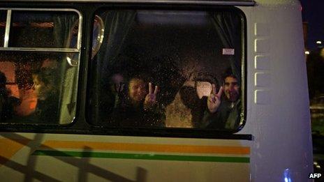 Greenpeace activists flash "V for victory" signs as they arrive at the offices of the Russian Investigative Committee in Murmansk (photo from Greenpeace)