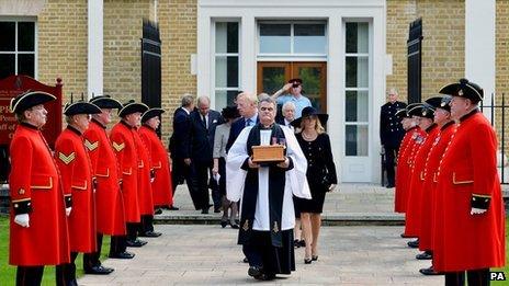 The Reverend Richard Whittington carries a casket containing Baroness Thatcher's ashes