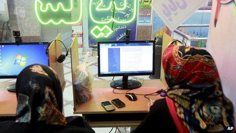 Iranian women surf the internet at a cafe in Tehran (file photo)