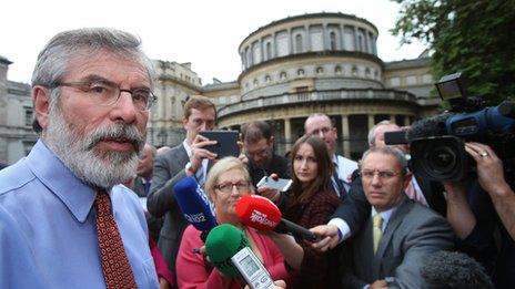 Gerry Adams was questioned by reporters outside the Irish parliament