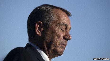 House Speaker John Boehner pauses while addressing the media on the government shutdown.