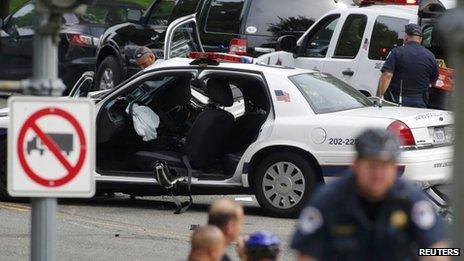 A damaged police vehicle was seen following reports of a shooting on Constitution Avenue near the US Capitol